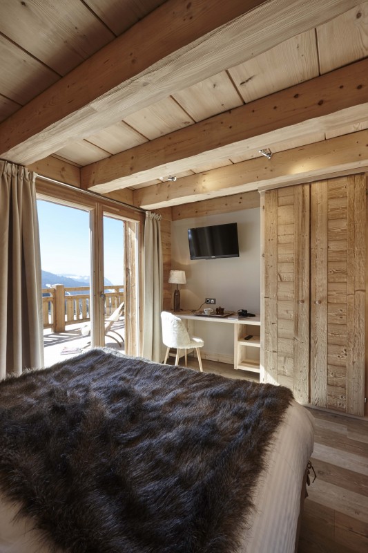 Hotel-Lodge-Le-Chasse-Montagne-chambre-duplex-superieur-location-appartement-chalet-Les-Gets