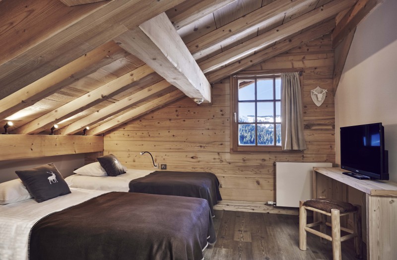 Hotel-Lodge-Le-Chasse-Montagne-chambre-quadruple-mezzanine-location-appartement-chalet-Les-Gets