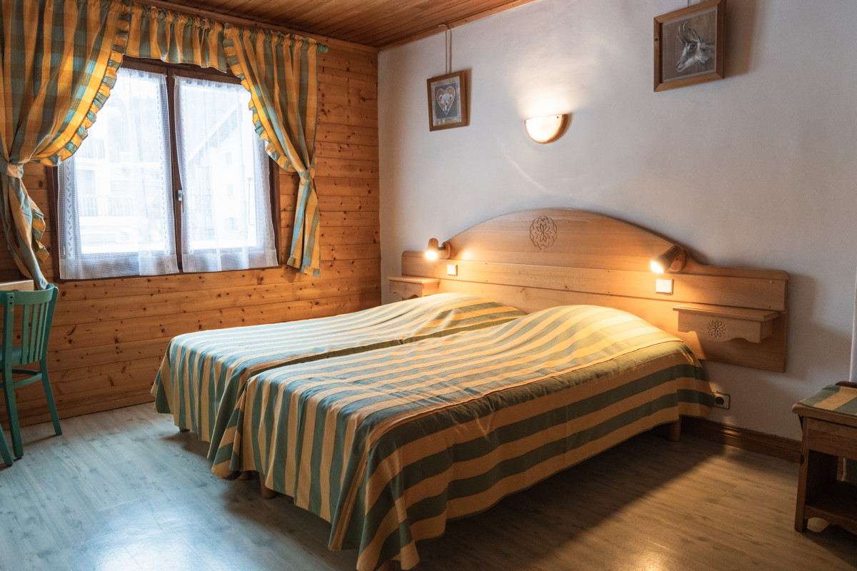 Chambre enfants avec 3 lits simples pour appartement 5 personnes aux Gets