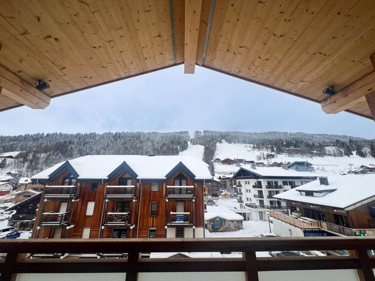 appartement-nagano-304-balcon-vue-hiver-location-appartement-chalet-Les-Gets