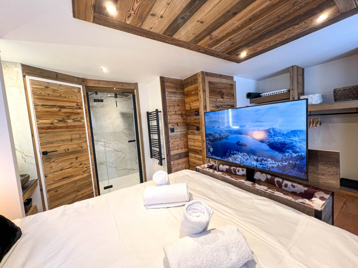 chalet-lumikki-chambre-lit-double-en-suite-location-appartement-chalet-Les-Gets