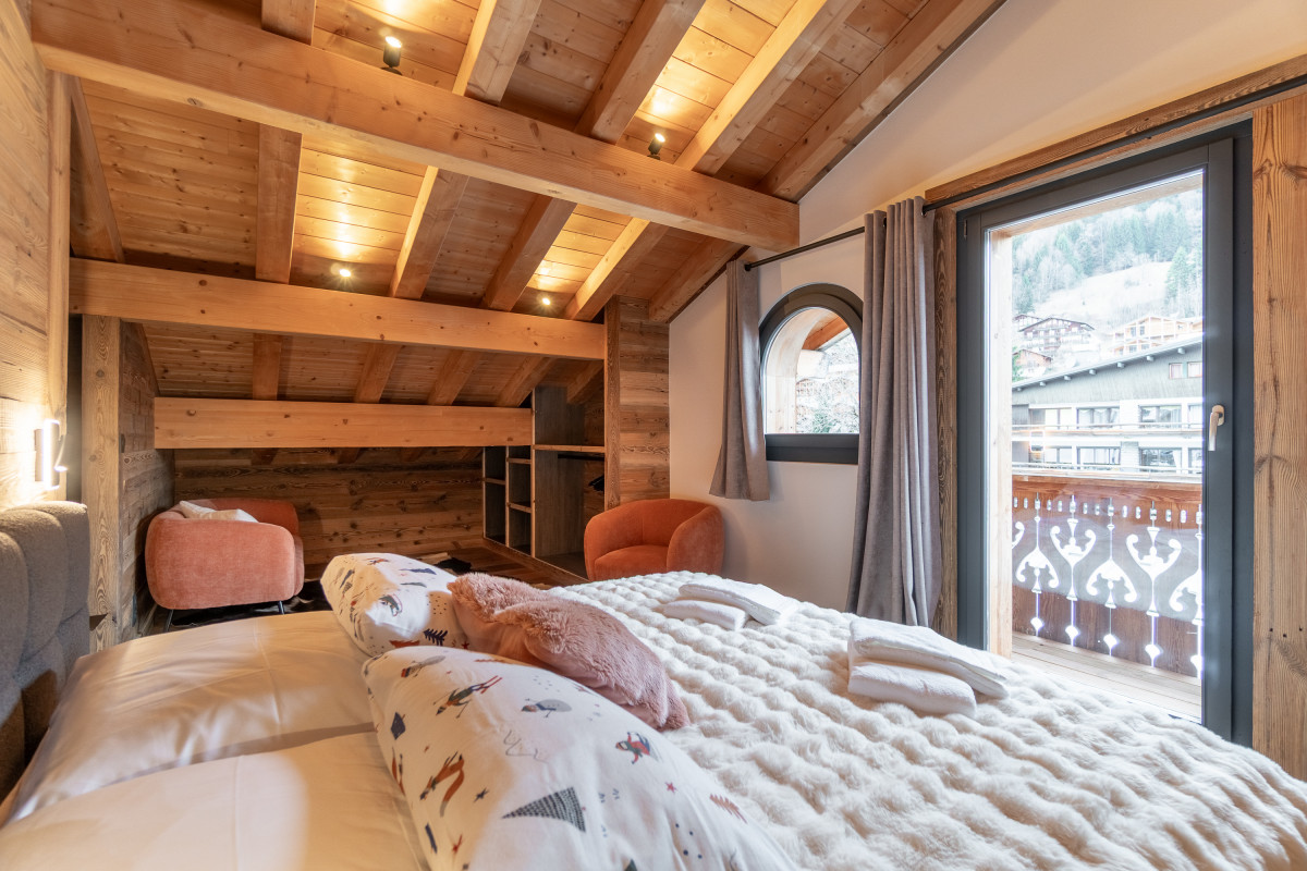 Chalet-Monet-chambre-lit-double-location-chalet-appartement-Les-Gets