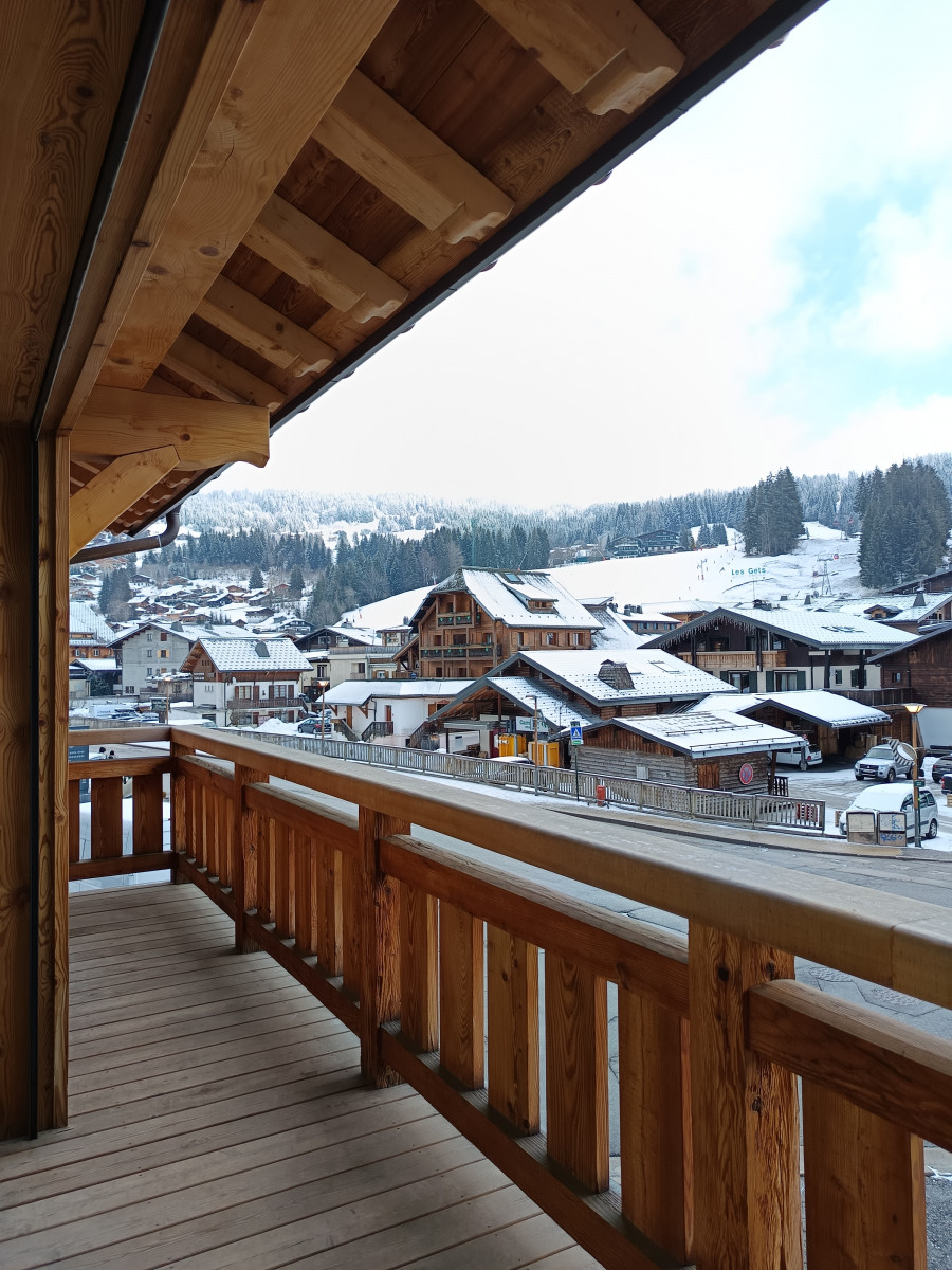 chaletcoppel1-balcon-vue-hiver-location-appartement-chalet-Les-Gets