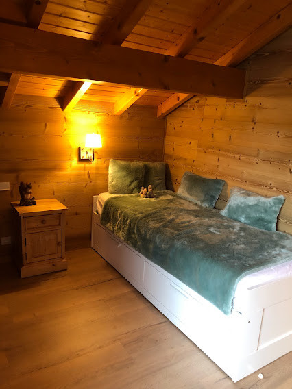 Manolou-chambre-lit-double-location-appartement-chalet-Les-Gets
