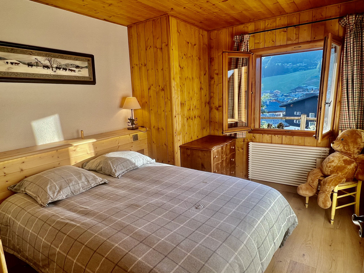 Rocali-chambre-lit-double-location-appartement-chalet-Les-Gets