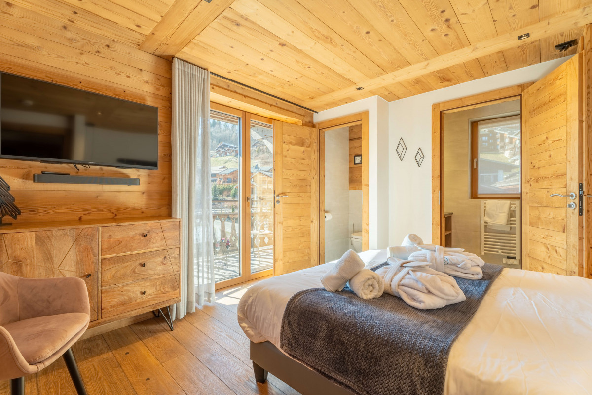 teleporte-chambre-lit-double-piste-bleue-2-appartement-chalet-Les-Gets-19529720