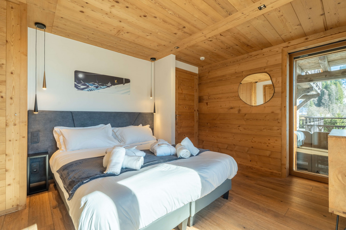 teleporte-chambre-lit-double-piste-bleue-4-appartement-chalet-Les-Gets-19529721