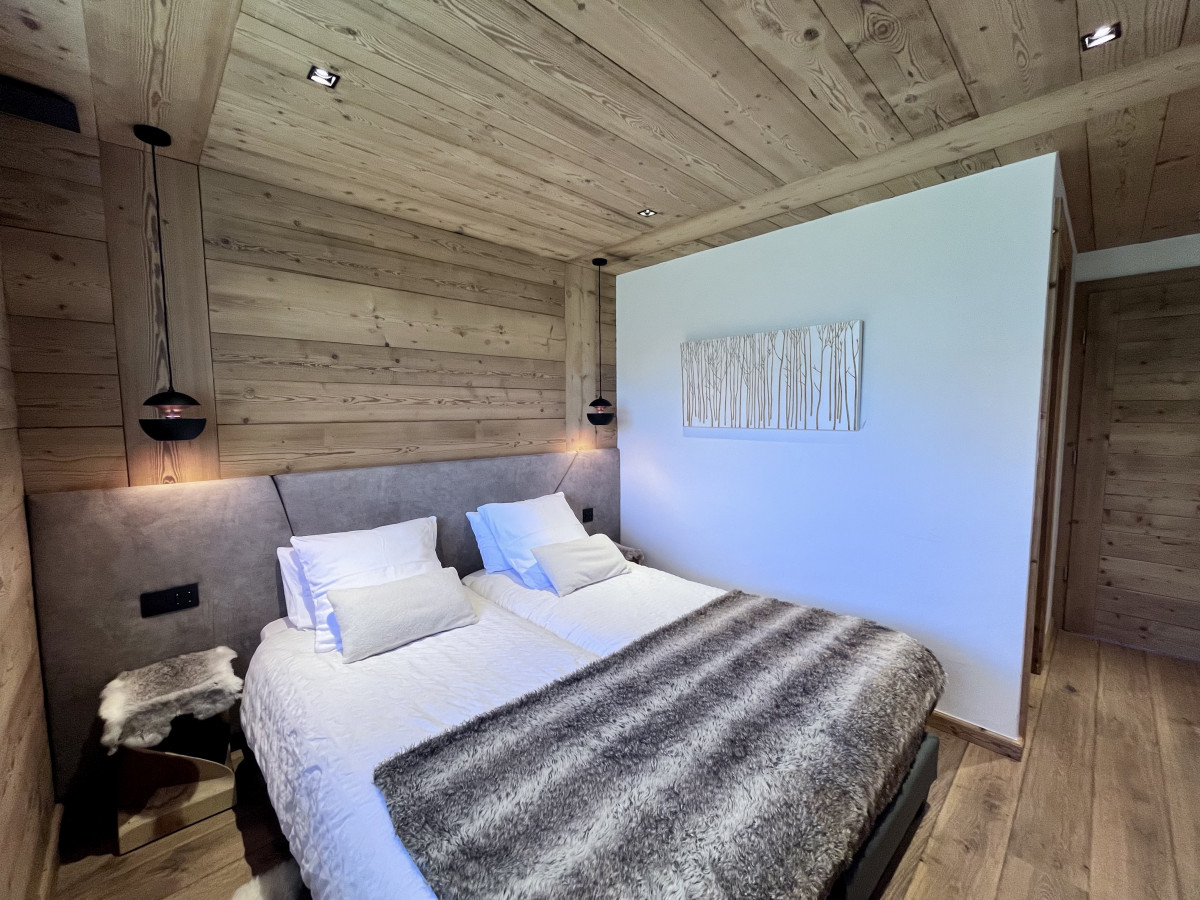 Teleporte-chambre-piste-verte-lit-double-location-appartement-chalet-Les-Gets