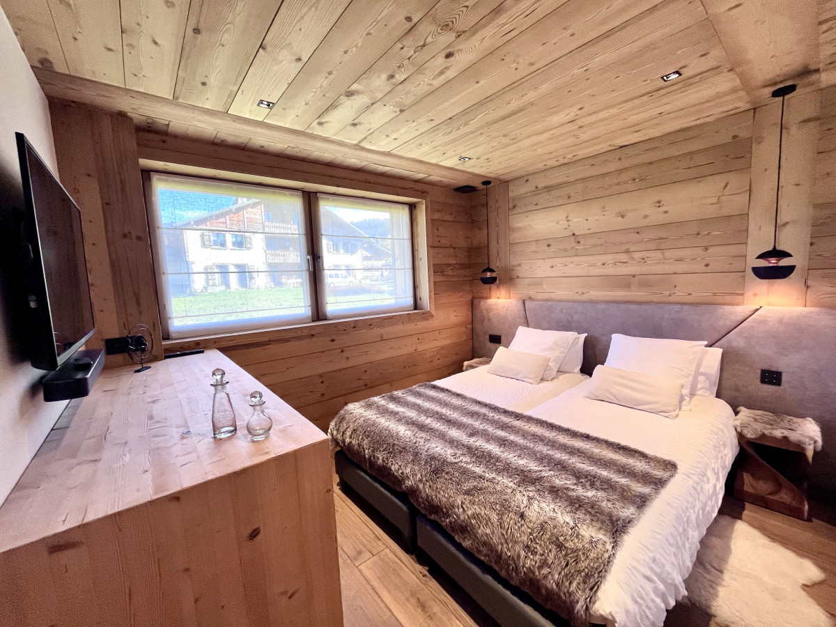 Teleporte-chambre-piste-verte-lit-double-location-appartement-chalet-Les-Gets