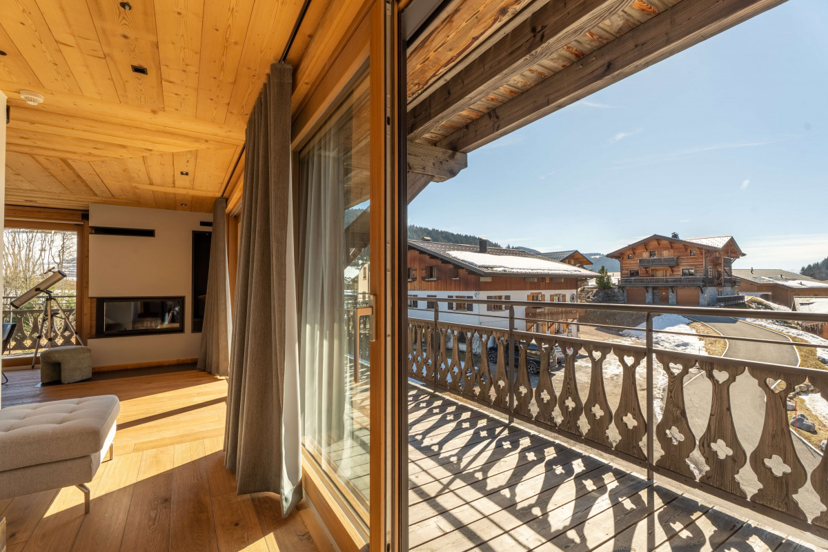 teleporte-vue-salon-appartement-chalet-Les-Gets-19529747