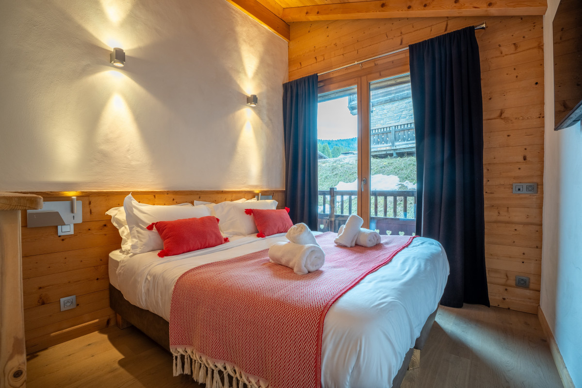 05-virolet-wetzet-chambre3-acces-balcon-19382344-location-appartement-chalet-Les-Gets