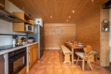 Arolle-Bouquetin-cuisine-coin-repas-location-appartement-chalet-Les-Gets