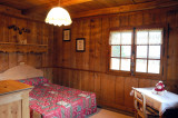 benevy-chambre-lit-double-location-appartement-chalet-Les-Gets