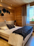 Berthet-Sports-Gentianes-chambre-lit-double-location-appartement-chalet-Les-Gets