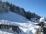 Caribou-1-terrasse1-hiver-location-appartement-chalet-Les-Gets