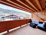 Carmine-A201-terrasse-salon-exterieur-location-appartement-chalet-Les-Gets