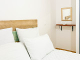 Carmine-Lodge-A206-chambre-lit-double-location-appartement-chalet-Les-Gets