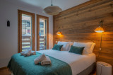 chalet-1066-solaret-B207-chambre-lit-double-location-appartement-chalet-Les-Gets