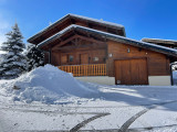 Chalet-bleu-vue-hiver-location-appartement-chalet-Les-Gets