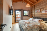 Chalet-Monet-chambre-lit-double-location-chalet-appartement-Les-Gets