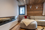 Chalet-Monet-salon-cheminee-location-chalet-appartement-Les-Gets