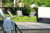 La-Rocade-1-exterieur-jardin-terrasse-jacuzzi-ete-location-appartement-chalet-Les-Gets