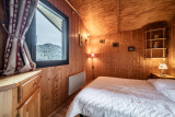 Moudon-Chalet17-intérieur-chambre-vue-location-appartement-chalet-Les-Gets
