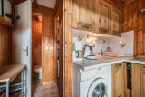 Moudon-Chalet17-intérieur-cuisine-lave-linge-location-appartement-chalet-Les-Gets