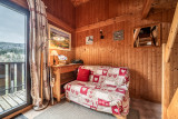 Moudon-Chalet17-intérieur-salon-canapé-location-appartement-chalet-Les-Gets