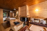 Pied-de-Adroit-5-sejour-salon-cheminee-location-appartement-chalet-Les-Gets