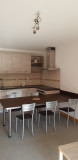 Rhodos-2-salon-cuisine-location-appartement-chalet-Les-Gets