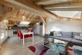 Suite-de-l-Alpe-Marcelly-salon-salle-a-manger-cuisine-location-appartement-chalet-Les-Gets