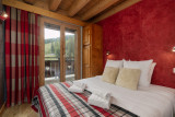 Suite-de-l-Alpe-Mont-Blanc-chambre-lit-double-location-appartement-chalet-Les-Gets