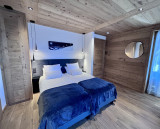 Teleporte-chambre-piste-bleue-lit-double-location-appartement-chalet-Les-Gets