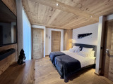 Teleporte-chambre-piste-bleue-lit-double-location-appartement-chalet-Les-Gets