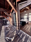 Teleporte-chambre-piste-noire-lit-double-balcon-location-appartement-chalet-Les-Gets