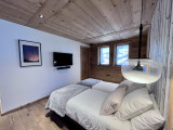 Teleporte-chambre-piste-rouge-lit-double-location-appartement-chalet-Les-Gets