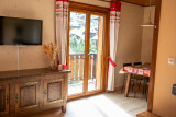 Tournier-C3-salon-salle-a-manger-location-chalet-appartement-Les-Gets