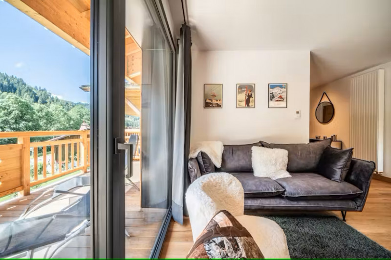 2023-06-elouera-10-sejour-location-chalet-appartement-les-gets-14327337