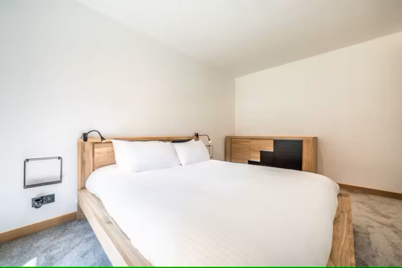 2023-06-elouera-22-chambre1-location-chalet-appartement-les-gets-14327345