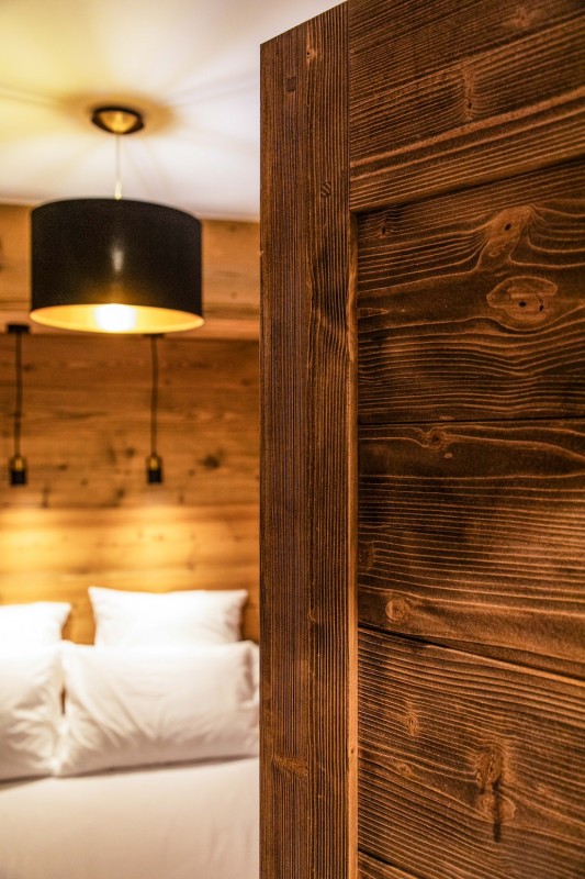 Carmine-A201-chambre-detail-location-appartement-chalet-Les-Gets