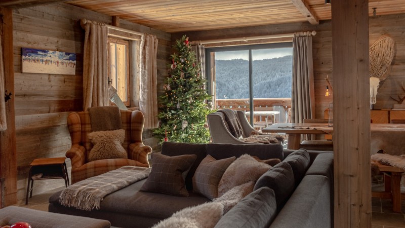 Maison-d-hiver-salon-canape-location-appartement-chalet-Les-Gets