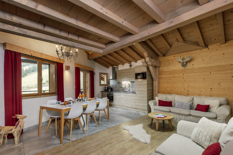 Suite-de-l-Alpe-Aiguille-du-Midi-salle-a-manger-salon-cuisine-location-appartement-chalet-Les-Gets