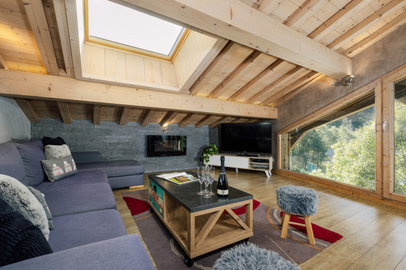 Suite-de-l-Alpe-Marcelly-salon-location-appartement-chalet-Les-Gets