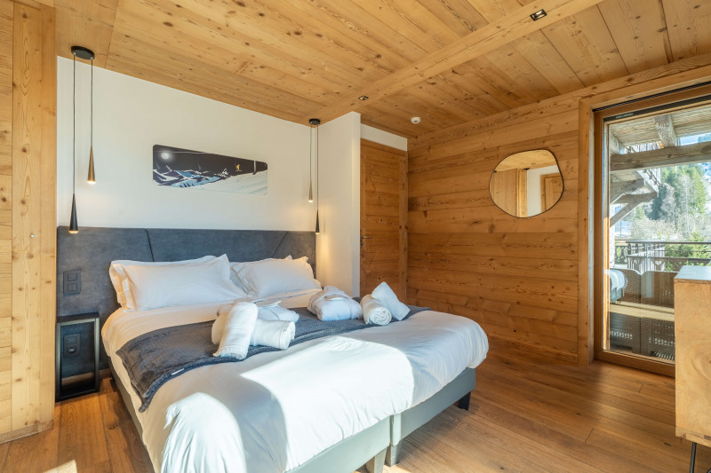 teleporte-chambre-lit-double-piste-bleue-4-appartement-chalet-Les-Gets-