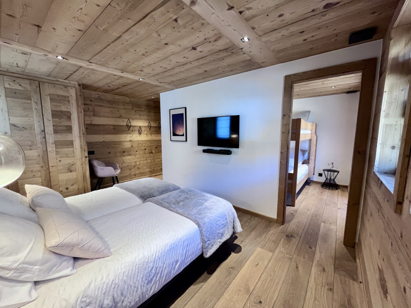 Teleporte-chambre-piste-rouge-lit-double-lits-superposes-location-appartement-chalet-Les-Gets