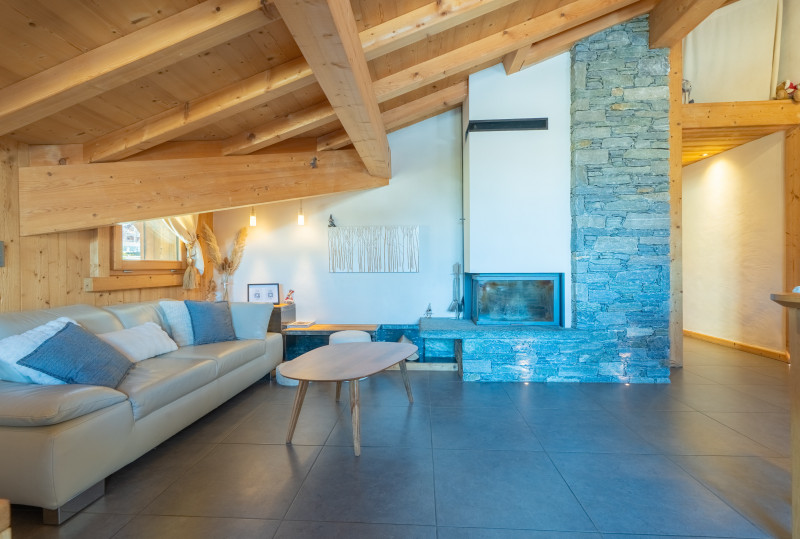 virolet-corniche-canape-cheminee-19382319-location-appartement-chalet-Les-Gets